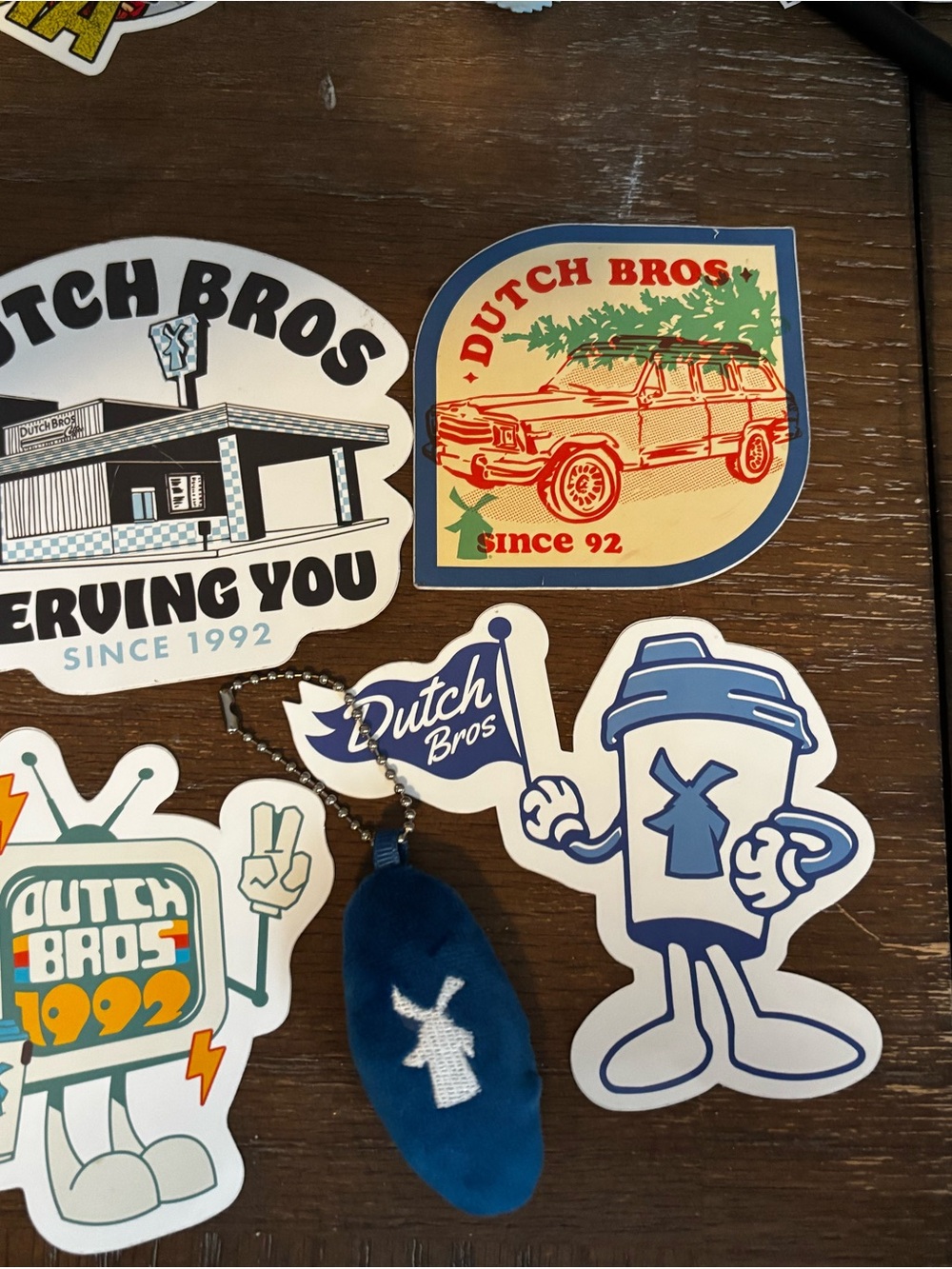 Dutch Bros Sticker and Plush Keychain Set - Blue, White, Red, Cream, Green